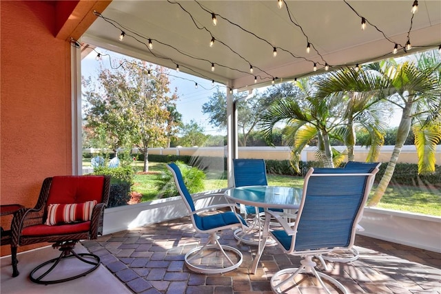 6375 Oxford Cir Unit 104D, Vero Beach, FL 32966 - view of patio / terrace with fence and outdoor dining area