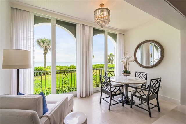 dining room with a water view