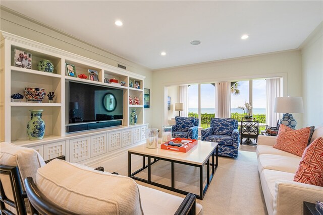 carpeted living room with crown molding