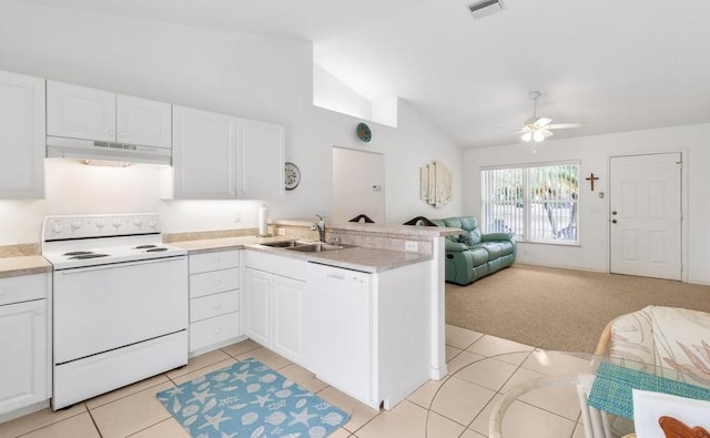 kitchen featuring lofted ceiling, sink, white cabinetry, kitchen peninsula, and white appliances