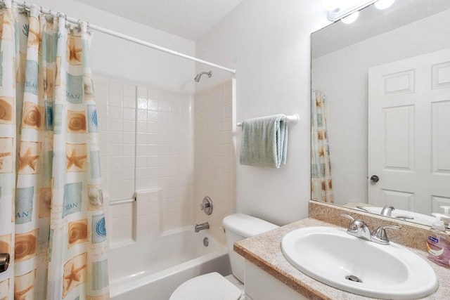 full bathroom with shower / bath combo, vanity, and toilet