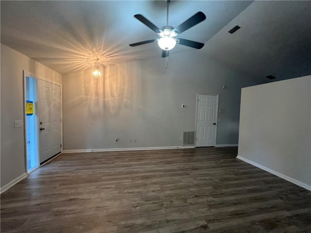 unfurnished room with ceiling fan, dark wood-type flooring, and high vaulted ceiling