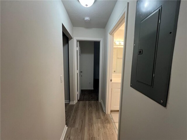 unfurnished bedroom featuring ceiling fan, dark carpet, and a closet