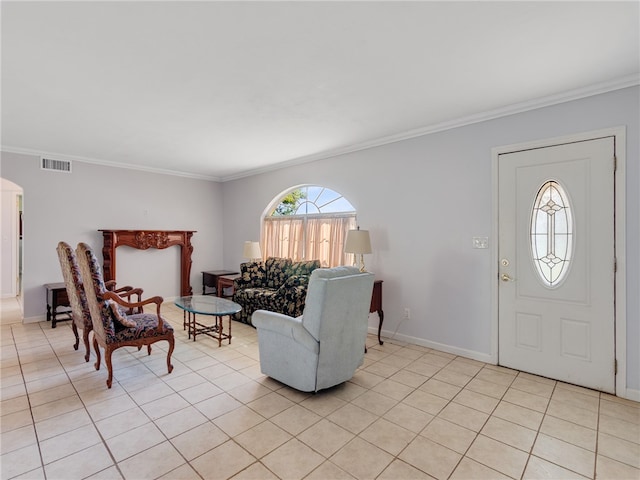 tiled foyer with ornamental molding