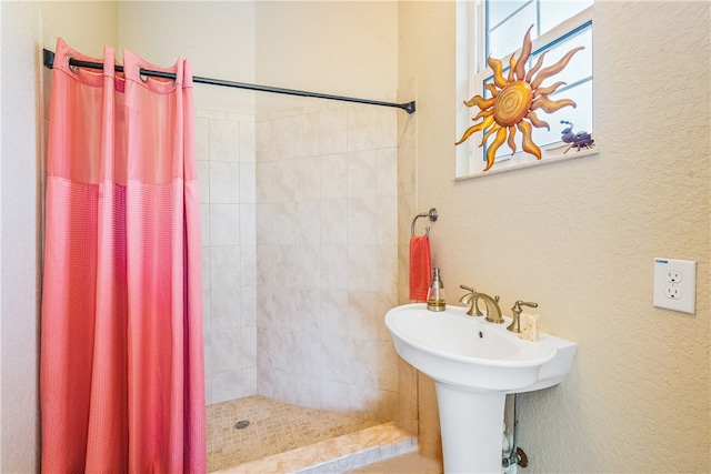 bathroom featuring walk in shower