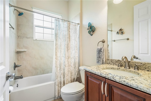 full bathroom with toilet, vanity, and shower / tub combo with curtain