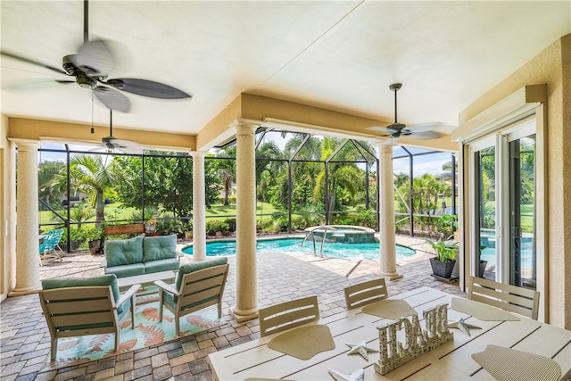 exterior space featuring ceiling fan and a swimming pool