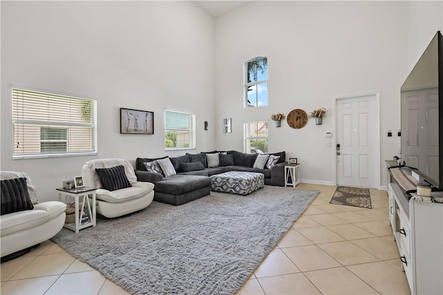 1782 Berkshire Cir SW, Vero Beach, FL 32968 - living room featuring a high ceiling and light tile patterned floors