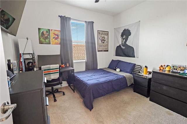 1782 Berkshire Cir SW, Vero Beach, FL 32968 - bedroom with light colored carpet, a desk, and ceiling fan
