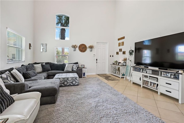 1782 Berkshire Cir SW, Vero Beach, FL 32968 - living area featuring a towering ceiling and light tile patterned flooring