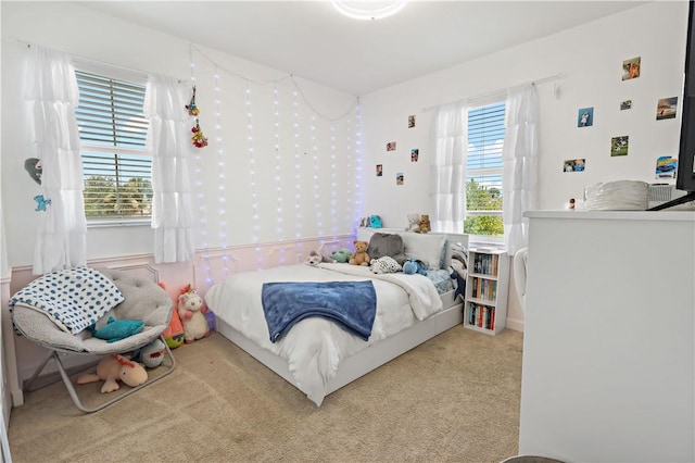 1782 Berkshire Cir SW, Vero Beach, FL 32968 - bedroom featuring carpet and multiple windows