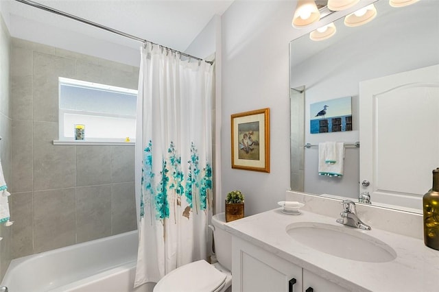 full bathroom featuring toilet, vanity, and shower / bath combination with curtain