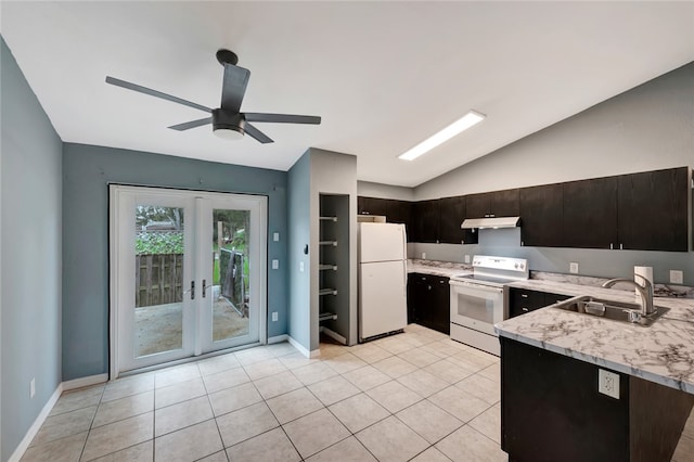 kitchen with french doors, vaulted ceiling, sink, light tile patterned floors, and white appliances