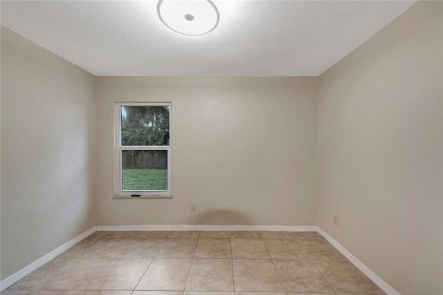 view of tiled spare room