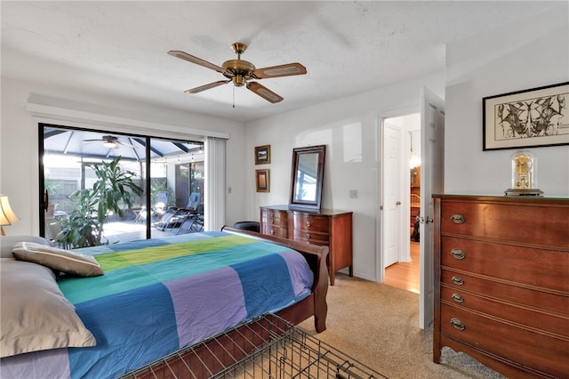 bedroom with ceiling fan, access to exterior, and light colored carpet