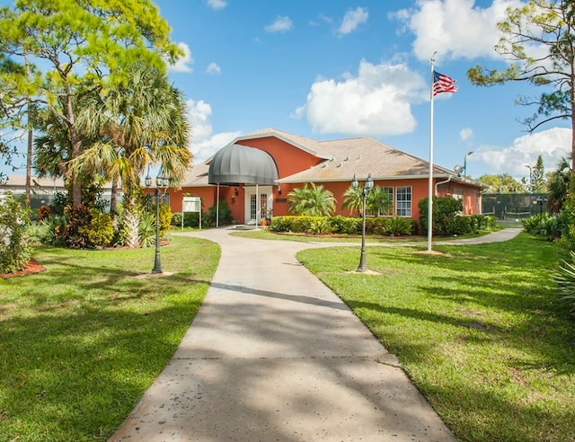 view of front of house with a front yard