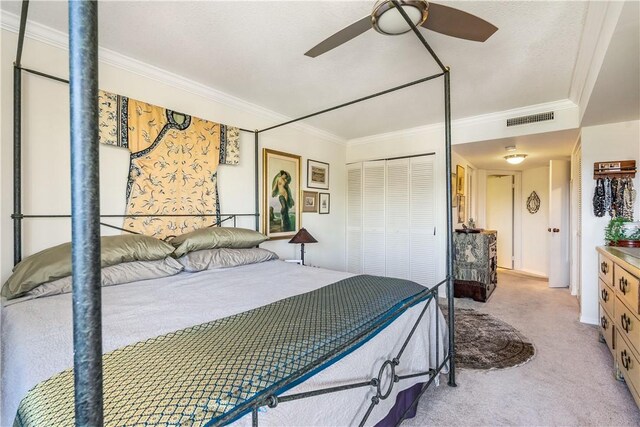 1821 Mooringline Dr Unit 3G, Vero Beach, FL 32963 - corridor featuring carpet flooring, crown molding, and a textured ceiling