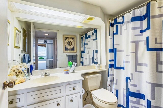 1821 Mooringline Dr Unit 3G, Vero Beach, FL 32963 - bathroom featuring vanity, a shower with curtain, and ceiling fan