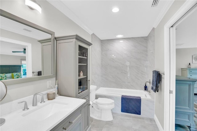 full bath featuring toilet, visible vents, vanity, a bath, and crown molding