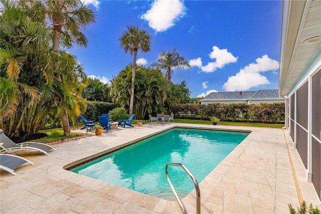 view of pool with a patio and a fenced in pool