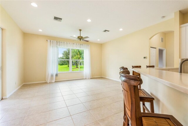 412 N Key Lime Sq SW, Vero Beach, FL 32968 - bathroom featuring separate shower and tub, tile patterned flooring, and vanity