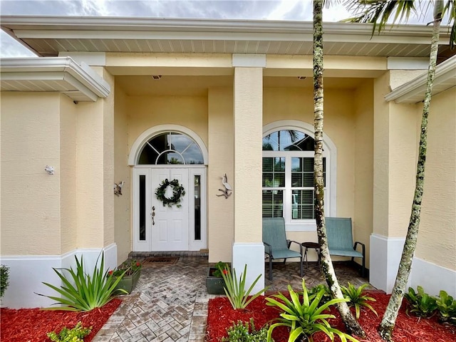 property entrance with a porch