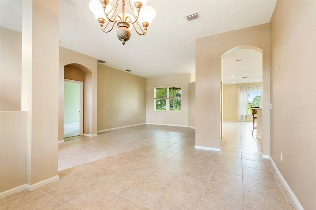 412 N Key Lime Sq SW, Vero Beach, FL 32968 - sunroom featuring ceiling fan and a water view
