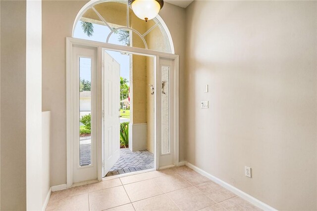 412 N Key Lime Sq SW, Vero Beach, FL 32968 - bedroom with ceiling fan and light colored carpet