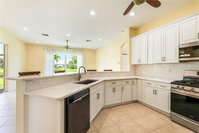 412 N Key Lime Sq SW, Vero Beach, FL 32968 - back of property with a lawn and a sunroom