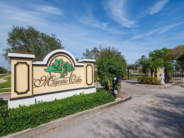 2523 12th Sq SW, Vero Beach, FL 32968 - community / neighborhood sign featuring fence and a gate