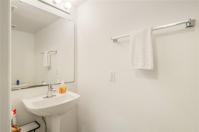 2523 12th Sq SW, Vero Beach, FL 32968 - bathroom featuring a sink