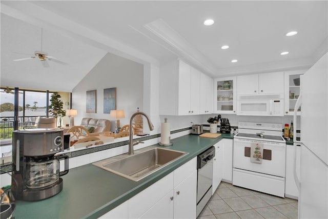 kitchen featuring ceiling fan, sink, light tile patterned flooring, white appliances, and white cabinets