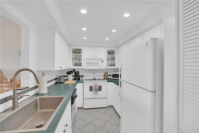 kitchen featuring white cabinetry, sink, white appliances, light tile patterned floors, and ornamental molding