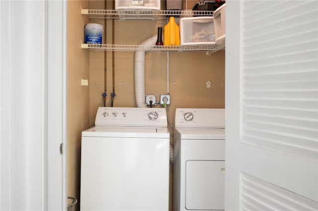 laundry area featuring laundry area and washer and dryer