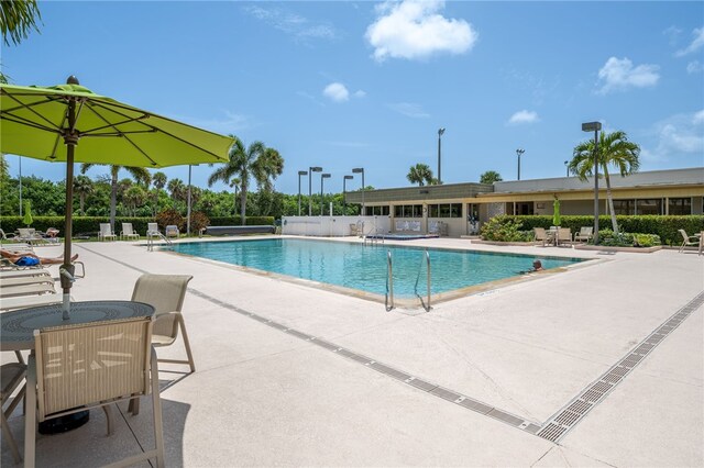pool with a patio area