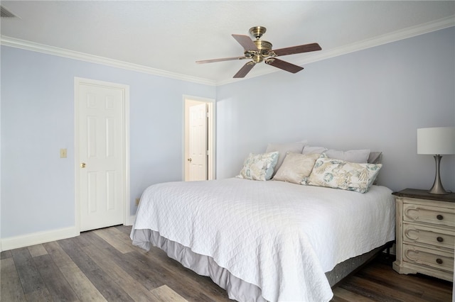 bedroom with crown molding, visible vents, wood finished floors, baseboards, and a ceiling fan