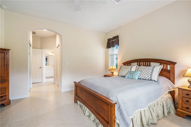 bedroom with light tile patterned floors and ceiling fan