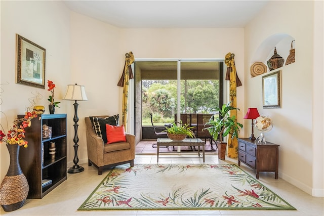 sitting room with light tile patterned floors