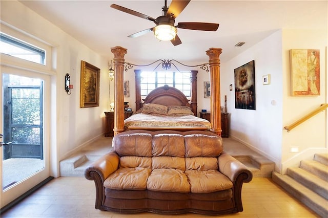 bedroom featuring ceiling fan, baseboards, visible vents, and access to exterior