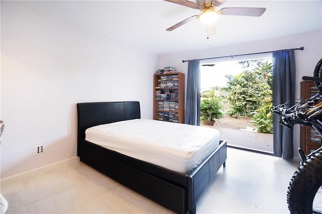 bedroom with ceiling fan and baseboards