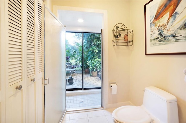 doorway to outside featuring tile patterned floors