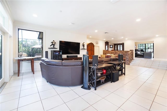 living area with light tile patterned floors and recessed lighting