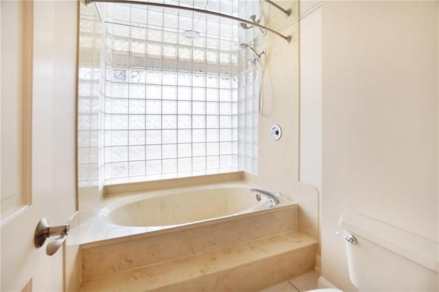 full bathroom with shower / washtub combination and toilet