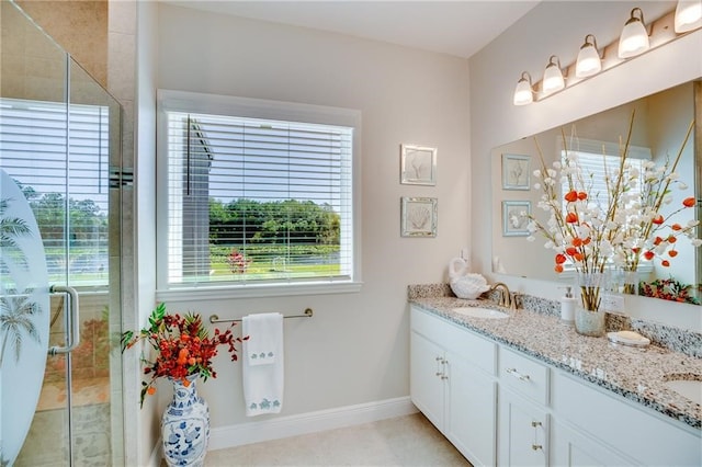 bathroom featuring walk in shower and a wealth of natural light