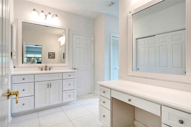 bathroom featuring tile patterned floors, visible vents, and vanity