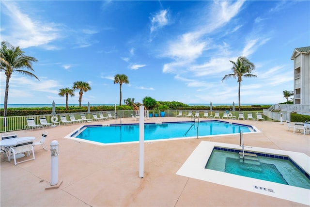 view of swimming pool featuring a patio