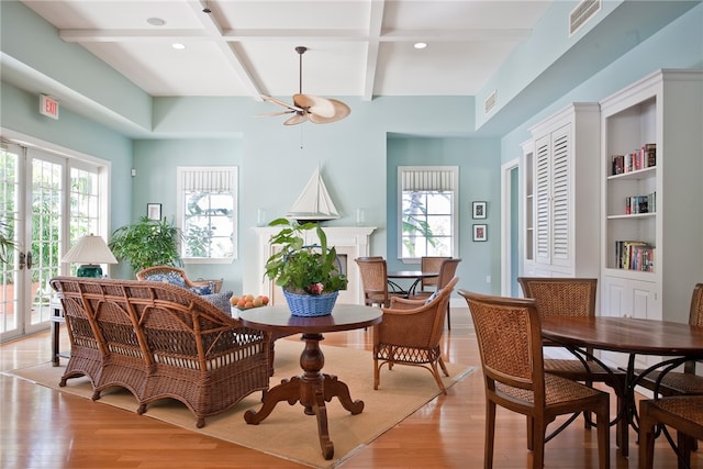 sitting room with ceiling fan, a healthy amount of sunlight, and light hardwood / wood-style flooring