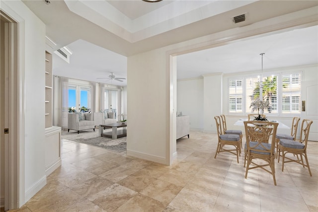 dining space with ceiling fan