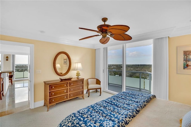 bedroom with crown molding, light carpet, access to outside, and ceiling fan