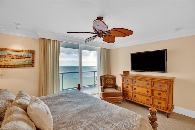 carpeted bedroom with ornamental molding, access to exterior, and ceiling fan